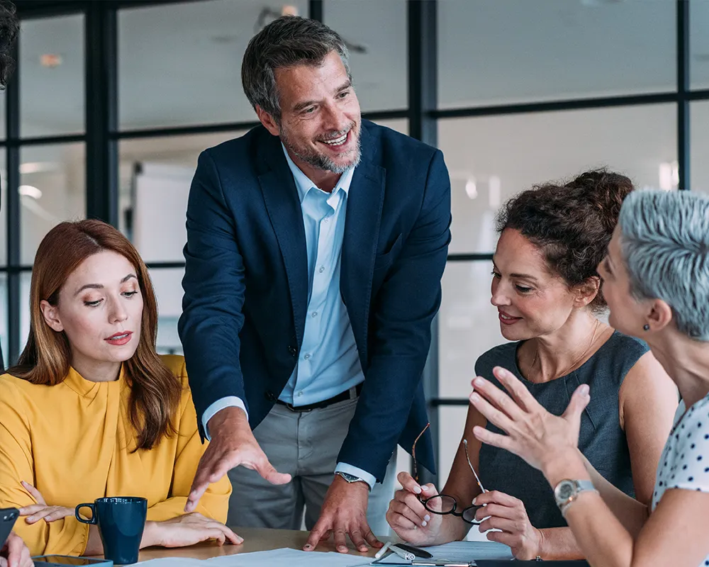 A man leads a meeting