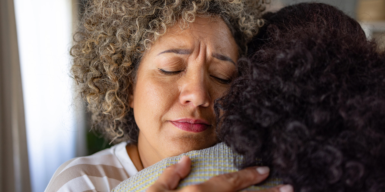 Woman comforting a friend