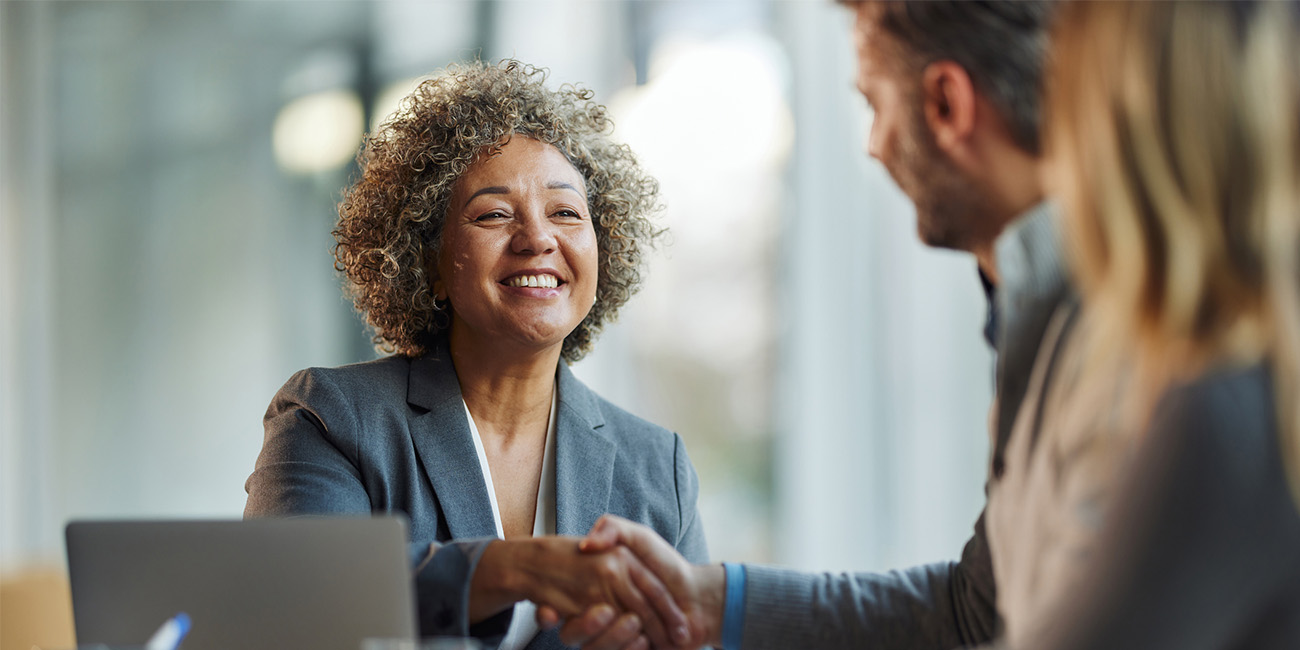 Woman consulting with a couple