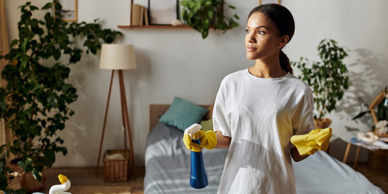 Woman cleaning a room.