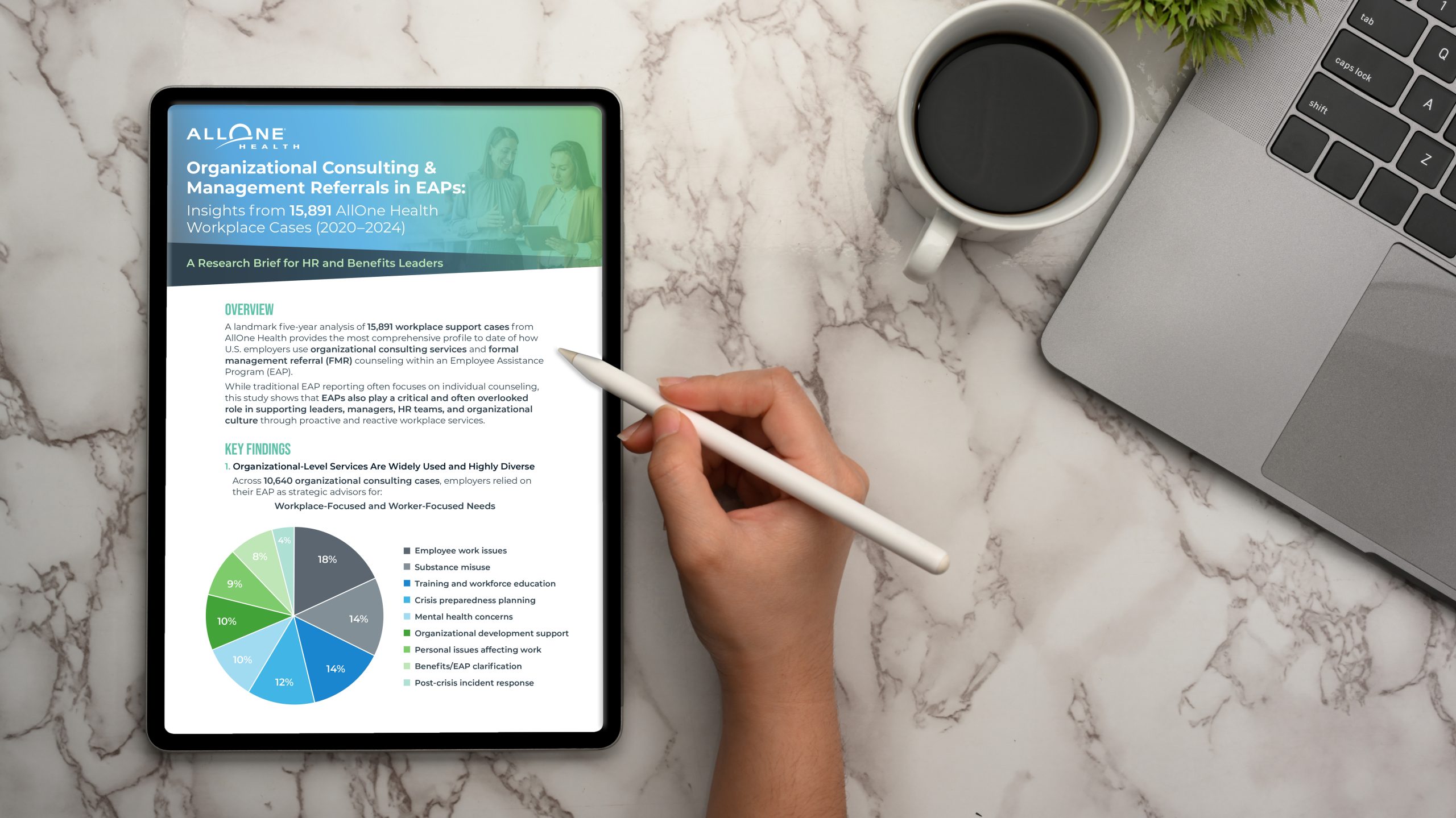 A female using stylus pen drawing on digital tablet on marble workspace. Someone on an Ipad showing Organization Consulting