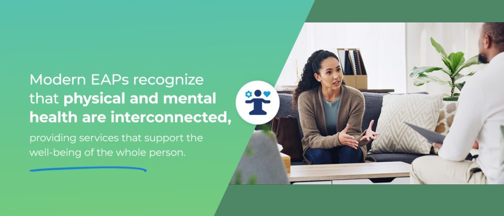 A therapist sitting down and talking with an employee 