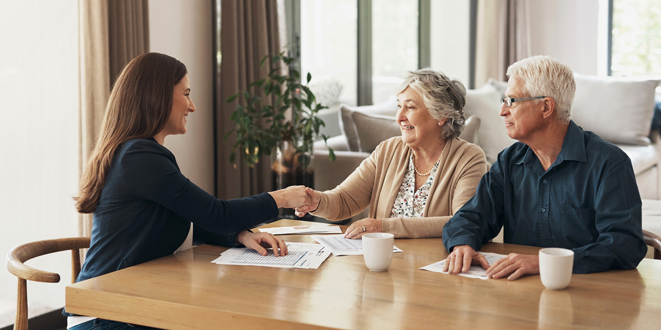Older couple meeting with an advisor