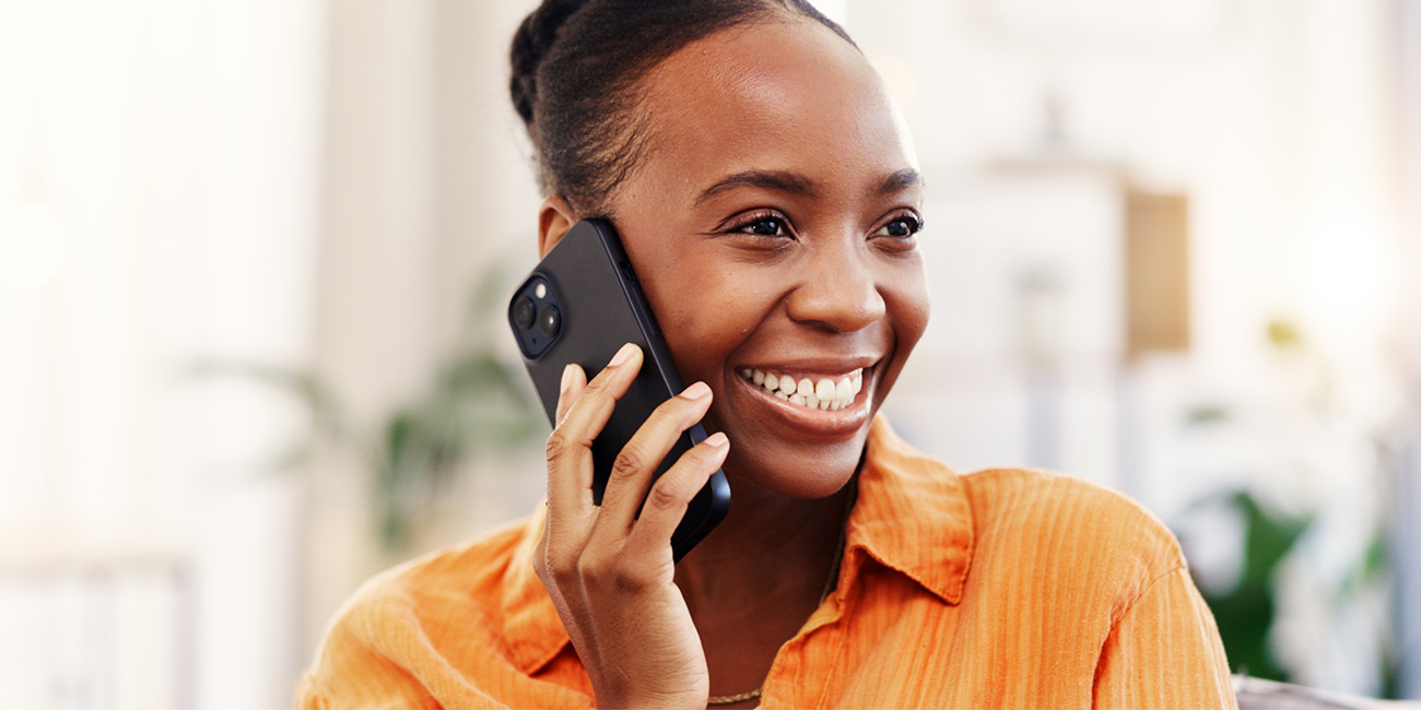 Woman smiling on the phone