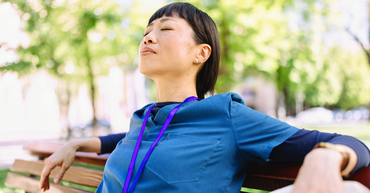 AOH-blog-Healthcare-CompassionFatigue Healthcare worker taking a break outside.